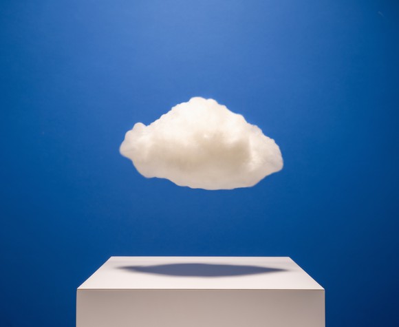 A cloud floating above a box.