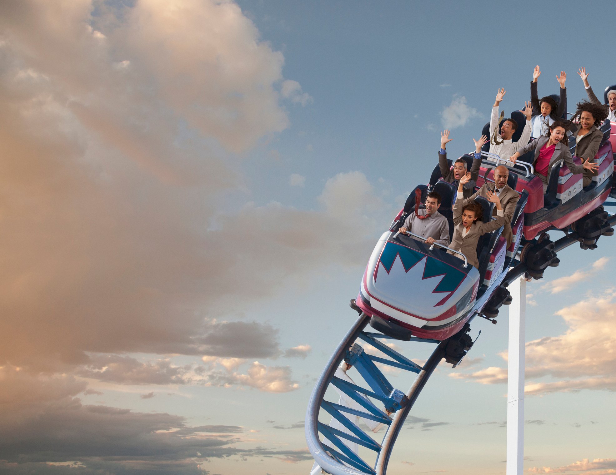 People on a roller coaster ride.