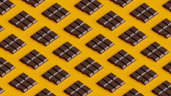 Chocolate squares sitting on a table.