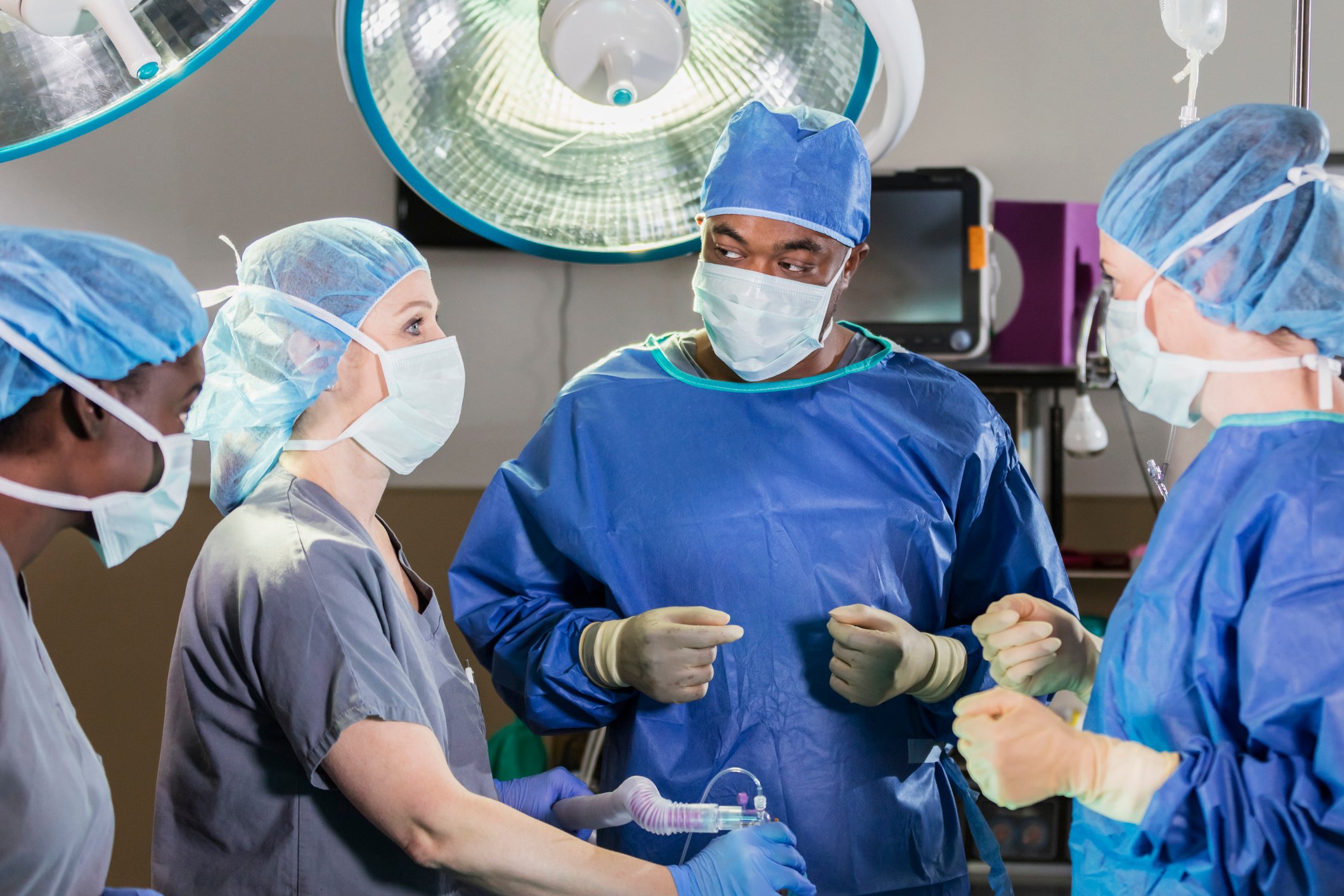 An operating room with surgeons and perioperative nurses.