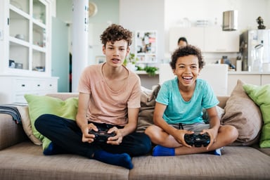 Two kids playing video games
