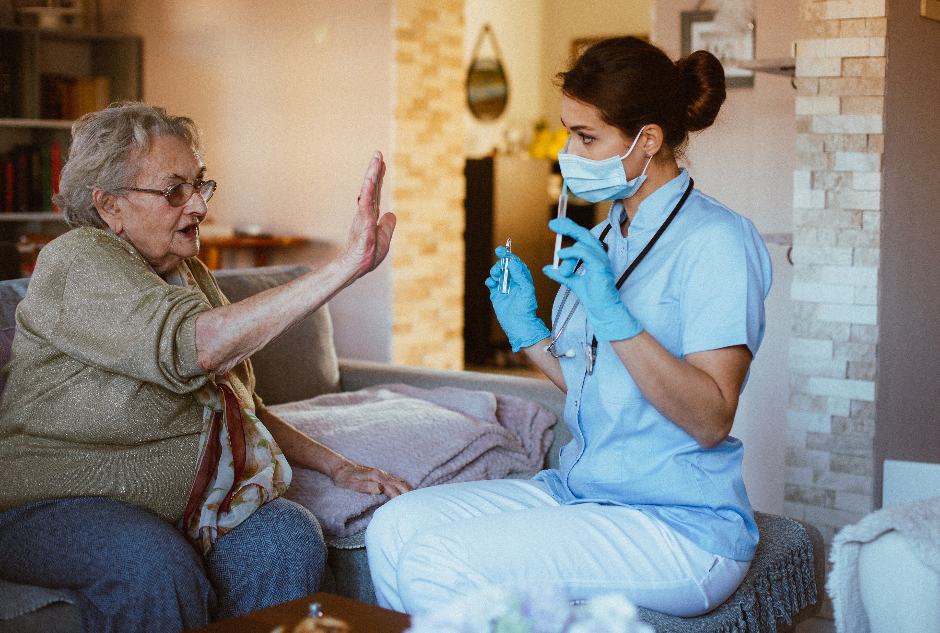Patient refusing an injection.