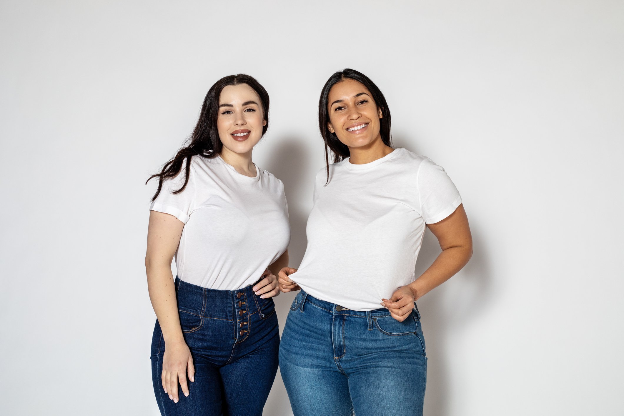 Two women wearing jeans and t-shirts