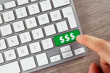 3 dollar signs on a keyboard