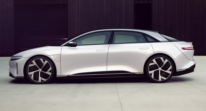 side view of white Lucid Air luxury electric sedan.