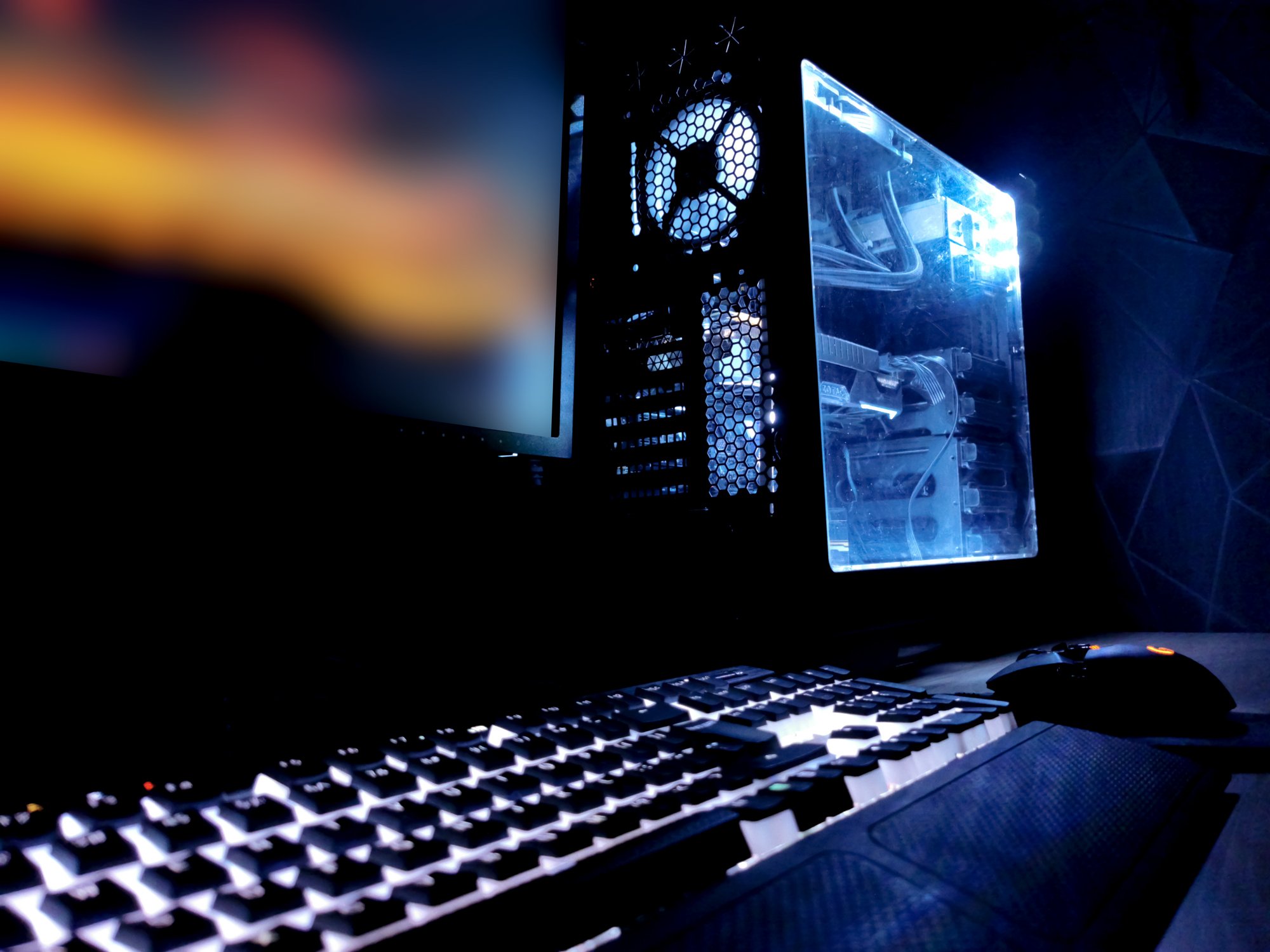 Internally lit computer with keyboard.