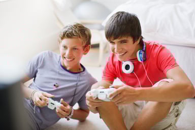 Two teens playing video games