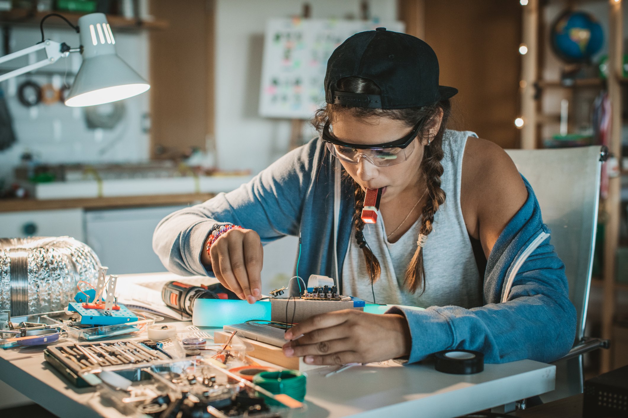 Girl building a computer