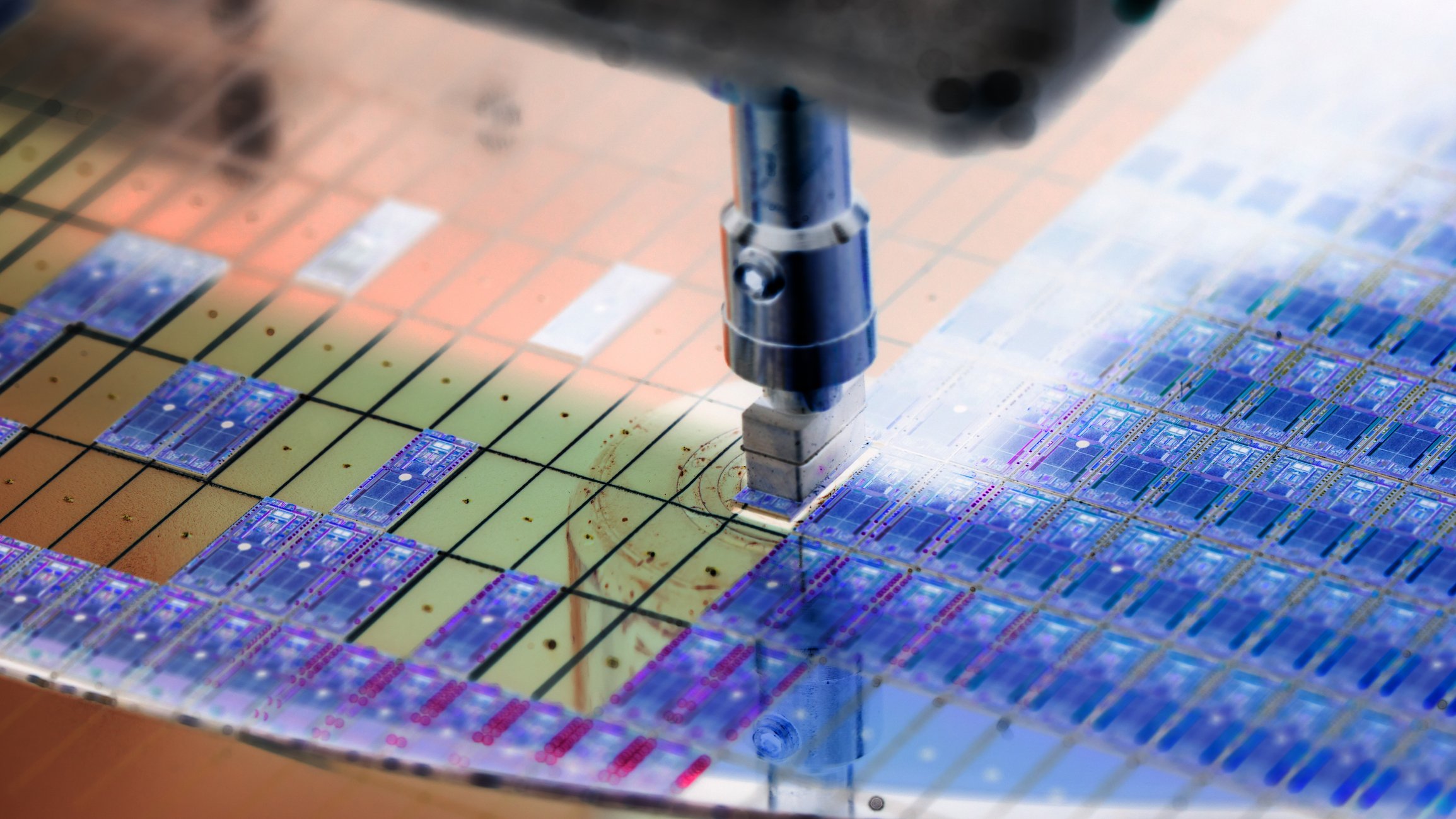 A machine etches wafers on a printed circuit board. 