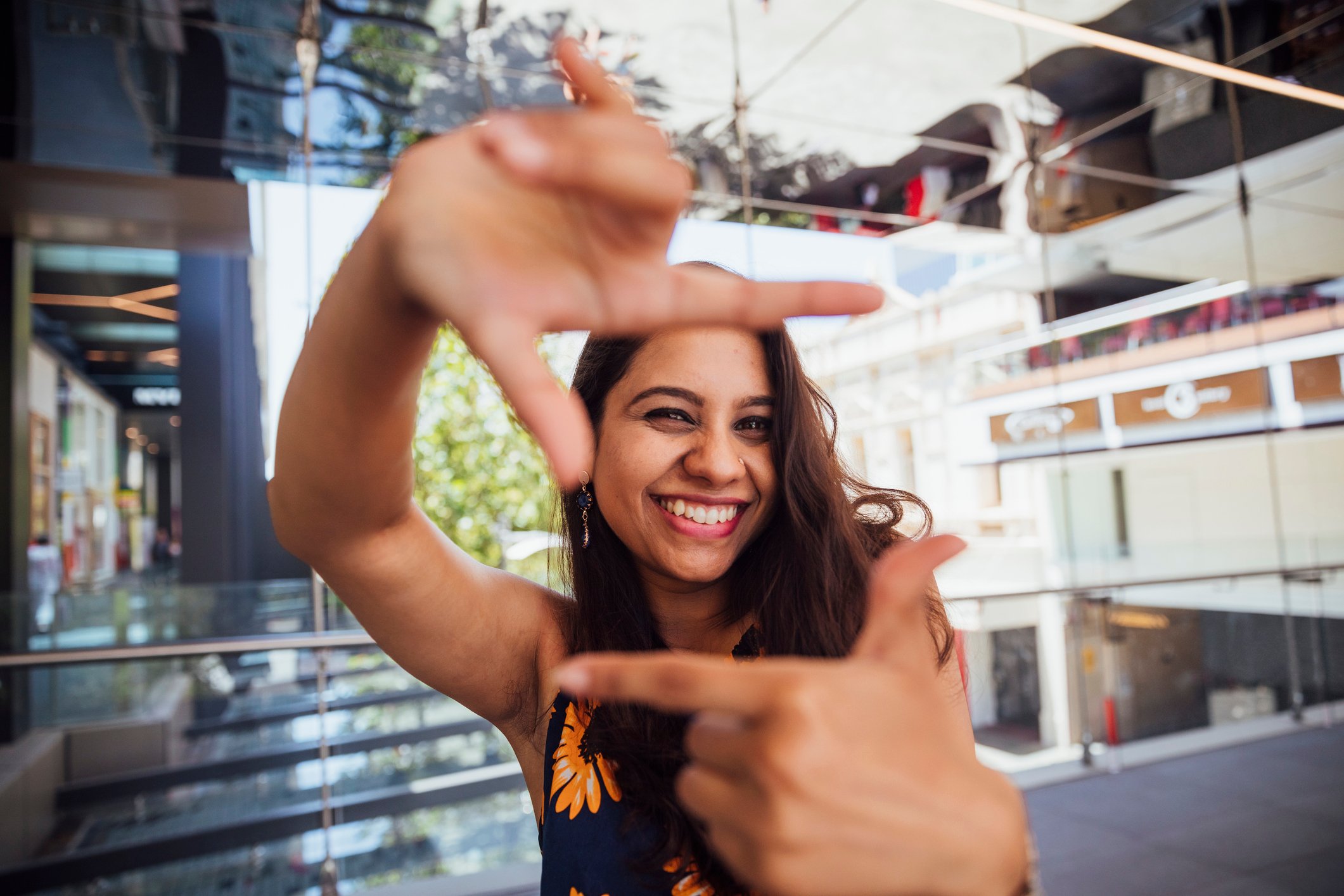 person viewing their point of view through their hands