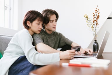 Couple Paying Bills Online