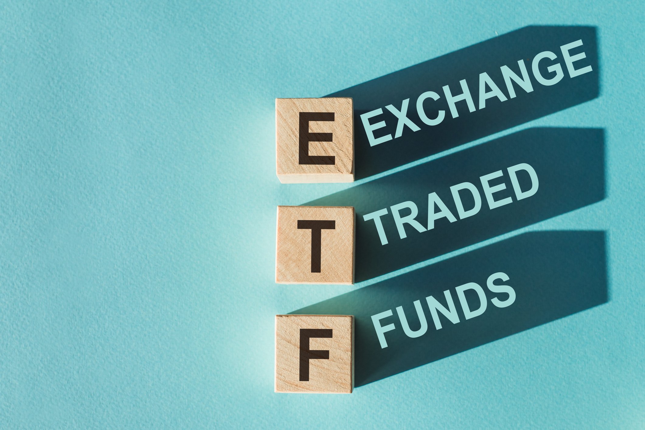 Blocks with the letters "ETF" on them and the words "Exchange traded funds" spelled out. 
