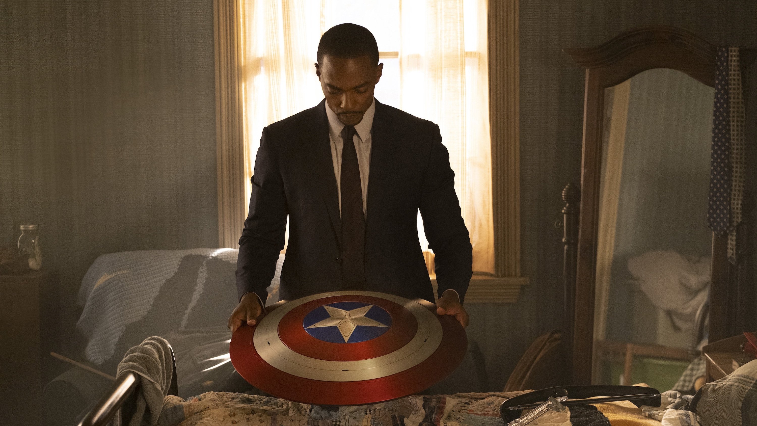 Falcon holding Captain America's shield.