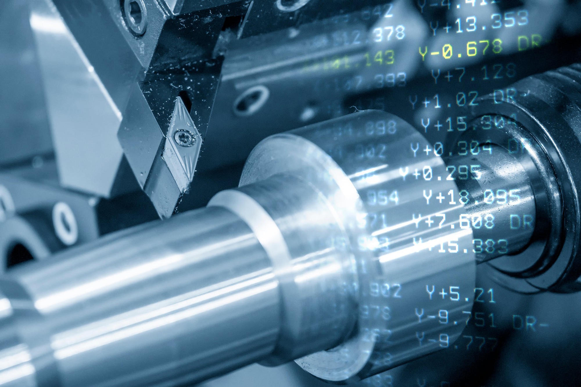 A piston on a piece of machinery with digital numbers floating on top.