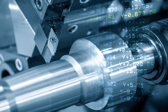 A piston on a piece of machinery with digital numbers floating on top.