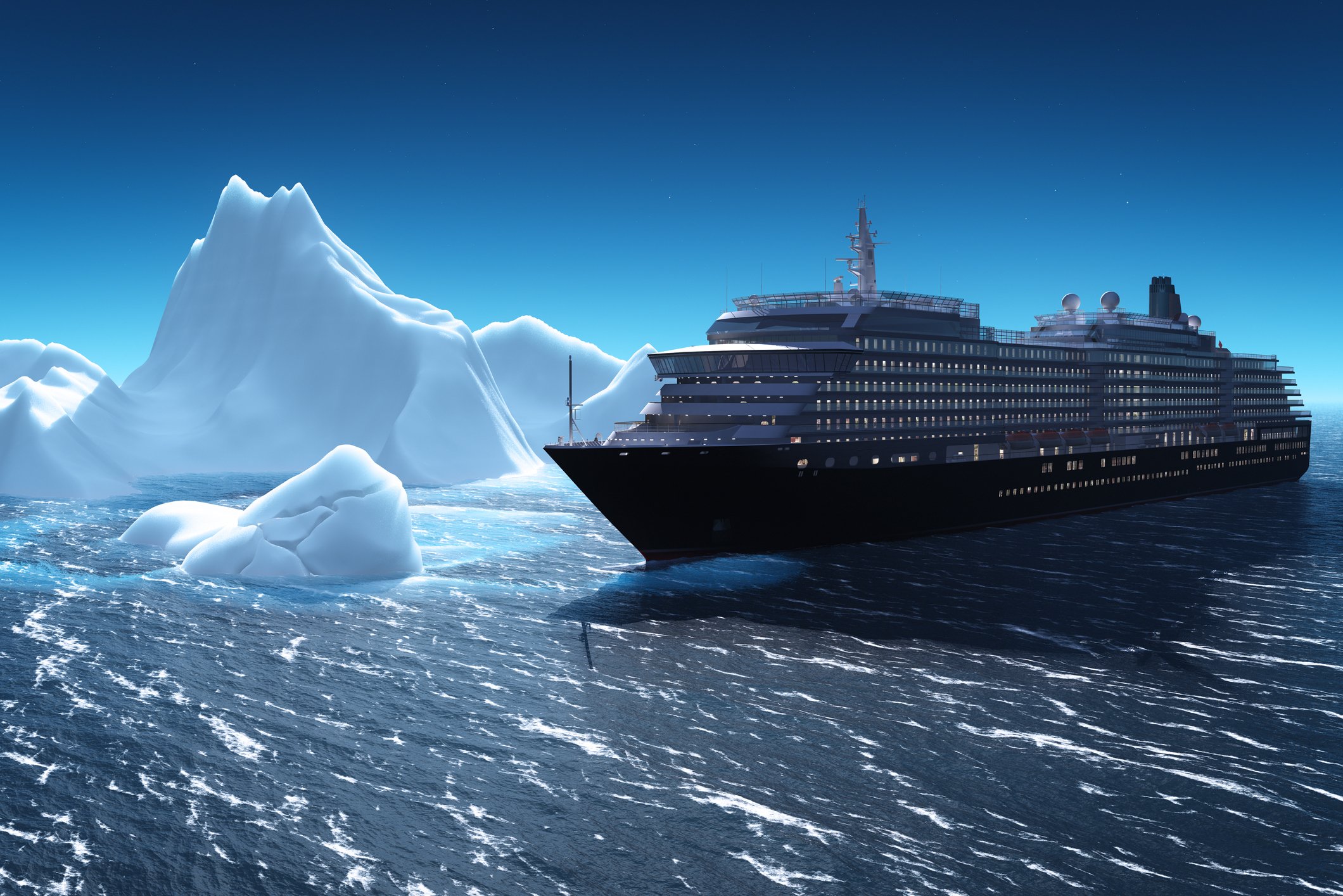 Cruise liner sailing past icebergs