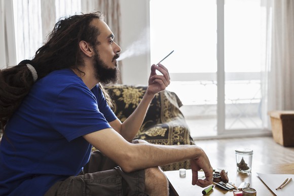 Smoking a high-concentration marijuana joint. 