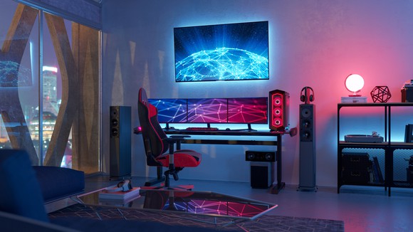 A room featuring a high-end gaming computer set-up