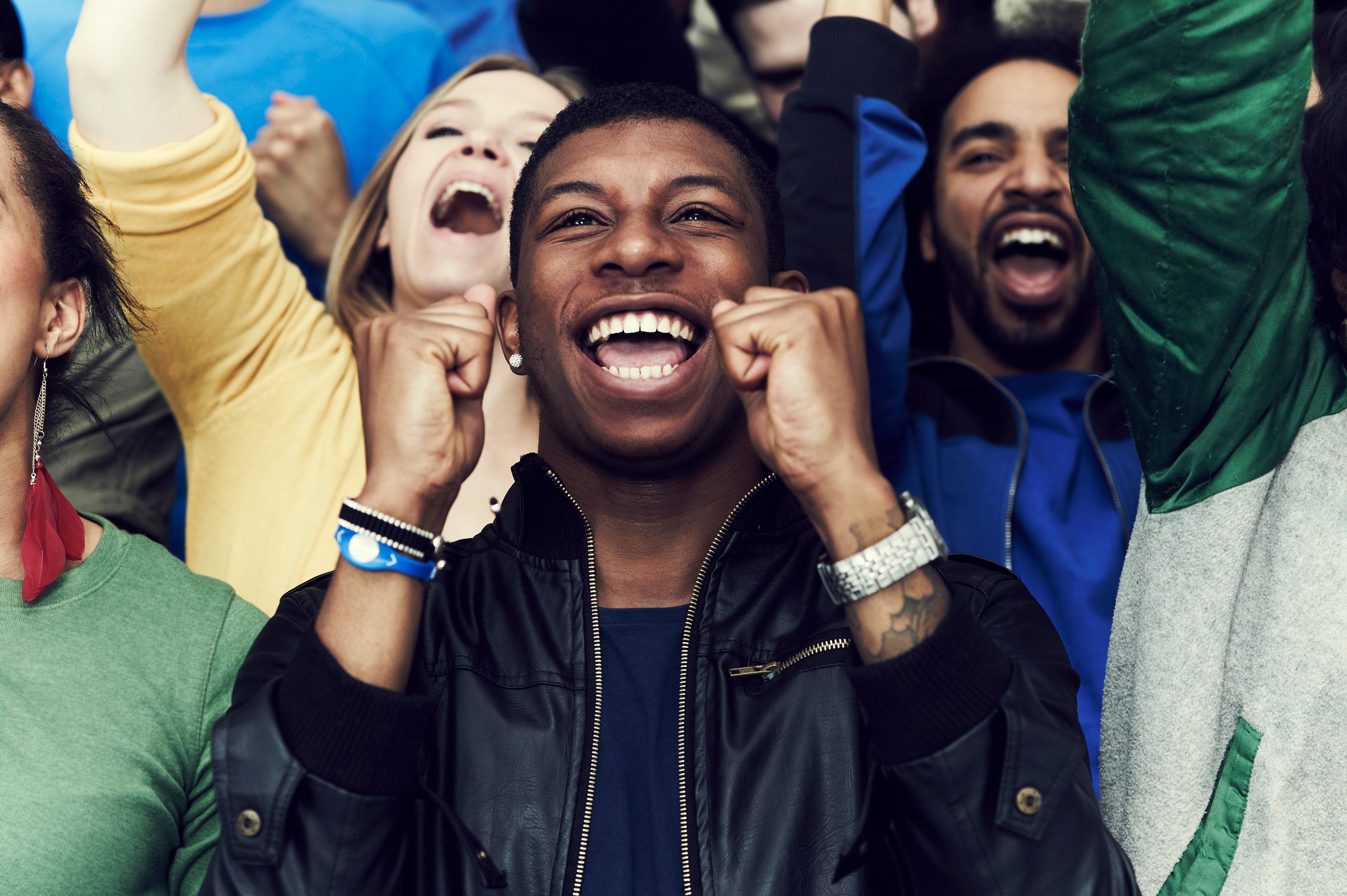 Person cheers on as a victory is achieved.