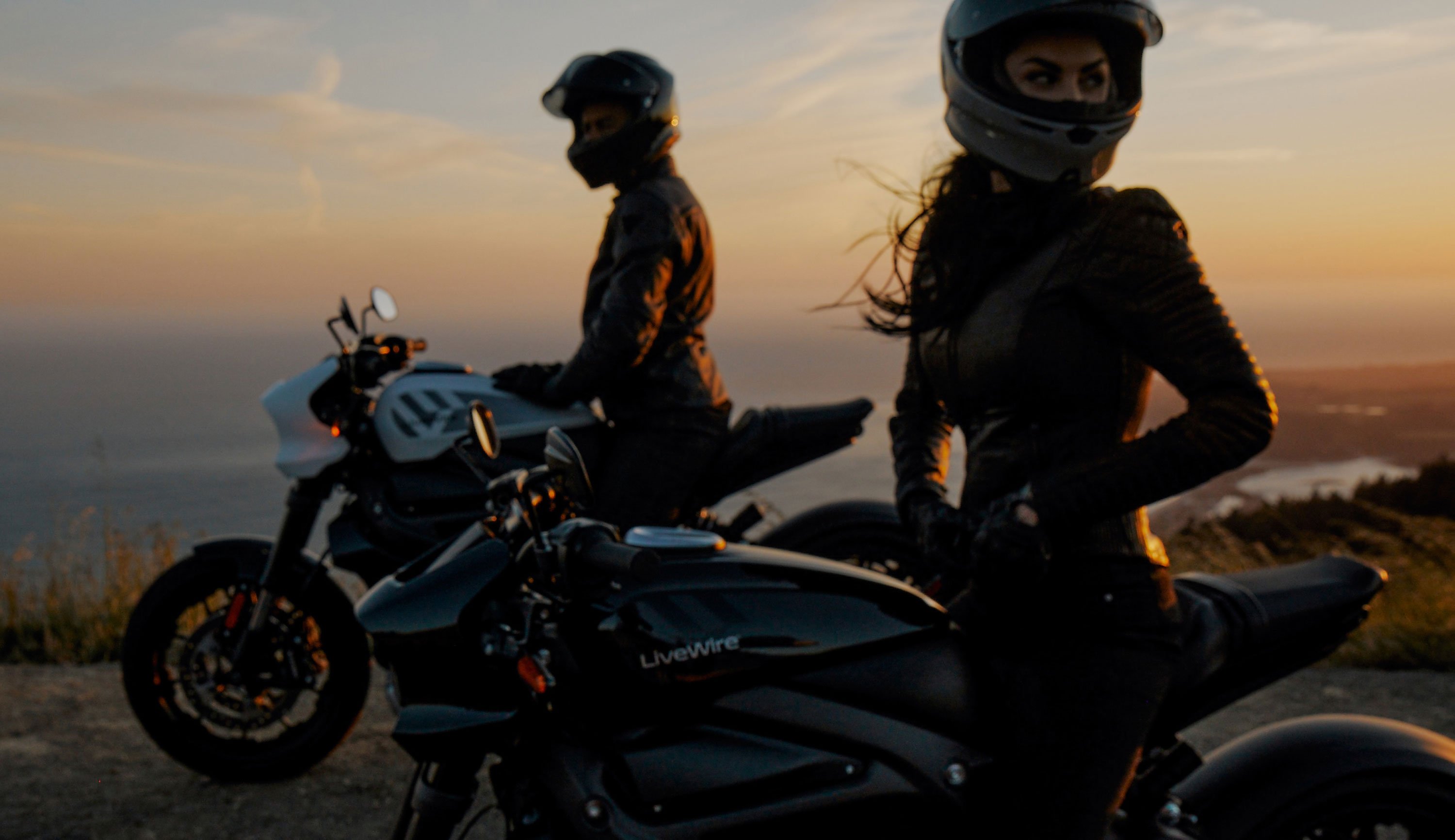 Motorcycle riders on Halrey LiveWire One bikes.