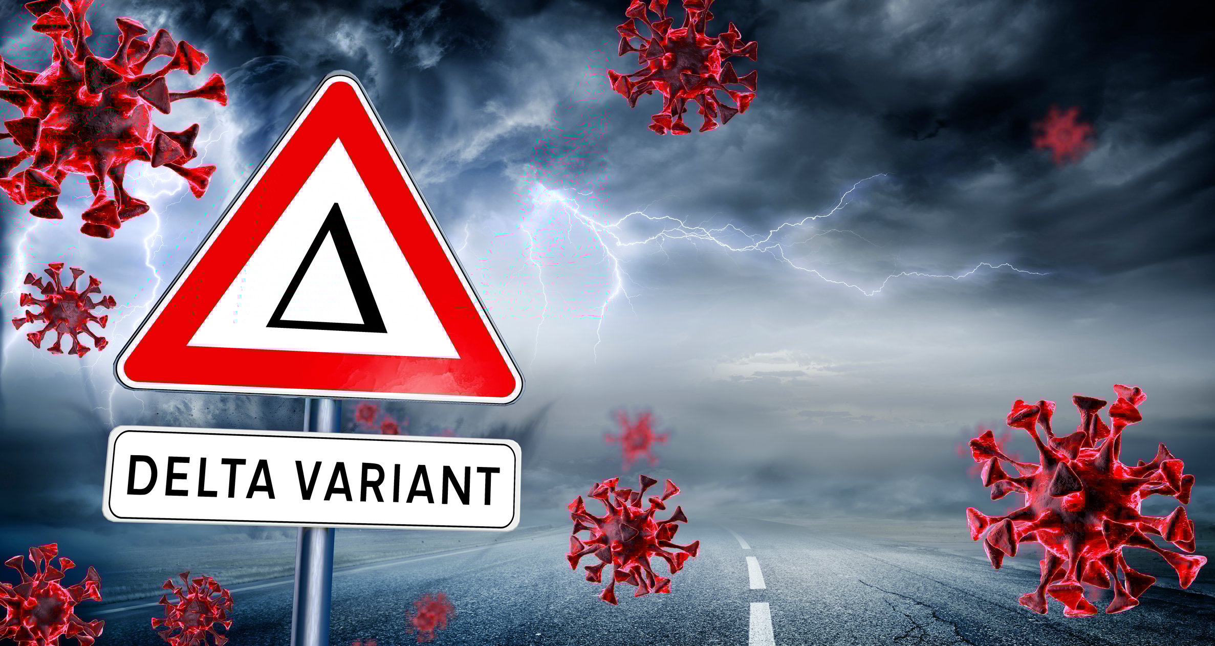 Delta variant sign with images of coronavirus virions and dark clouds with lightning in the background.