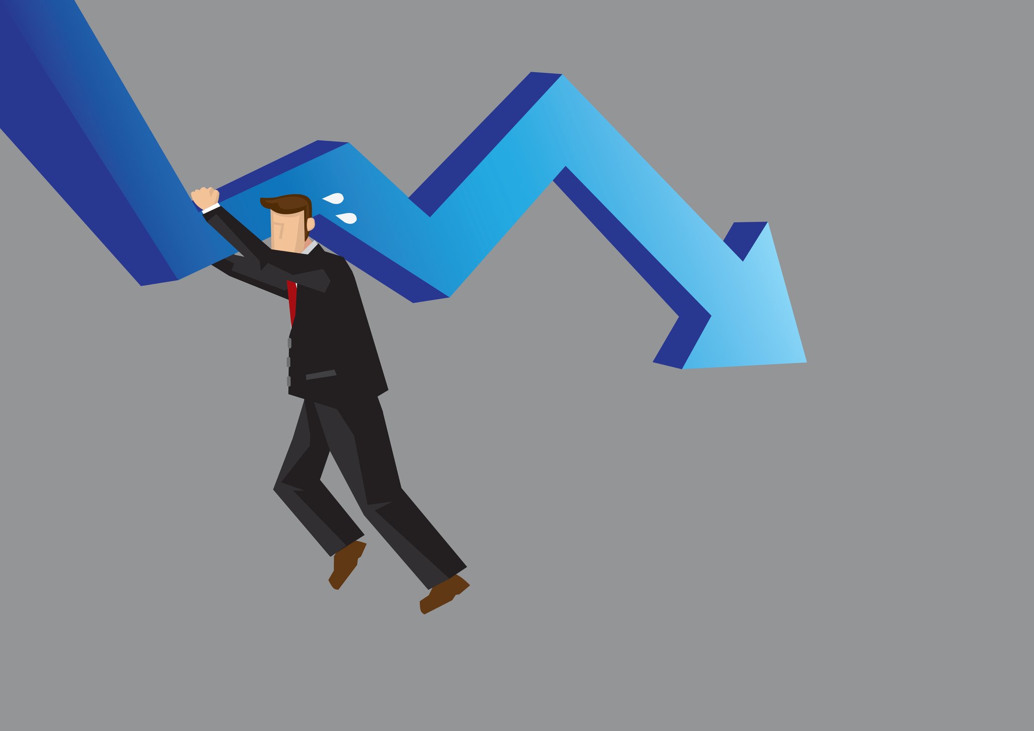 falling chart held up by businessman