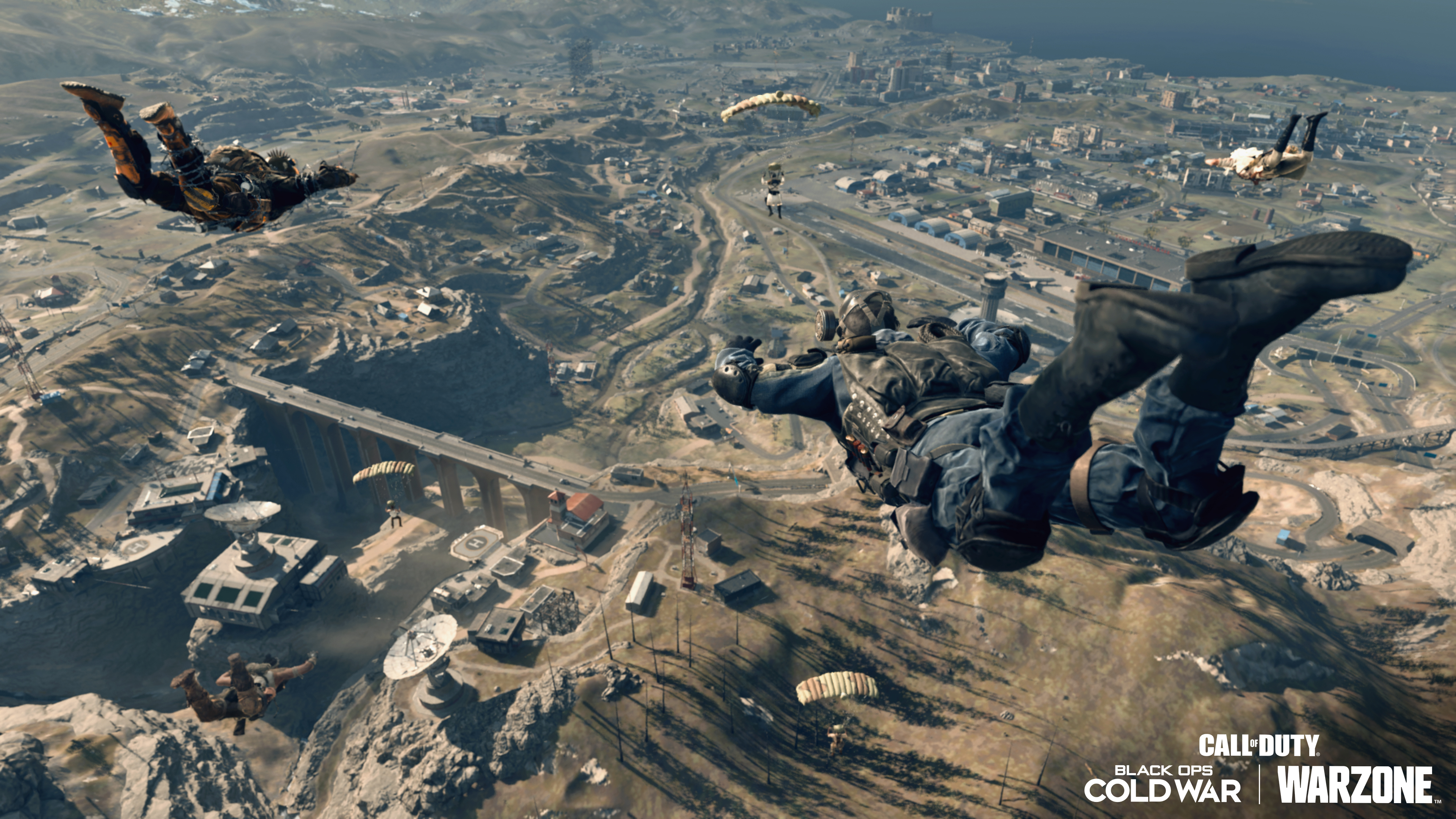 Soldiers skydiving in a scene from a Call of Duty video game.