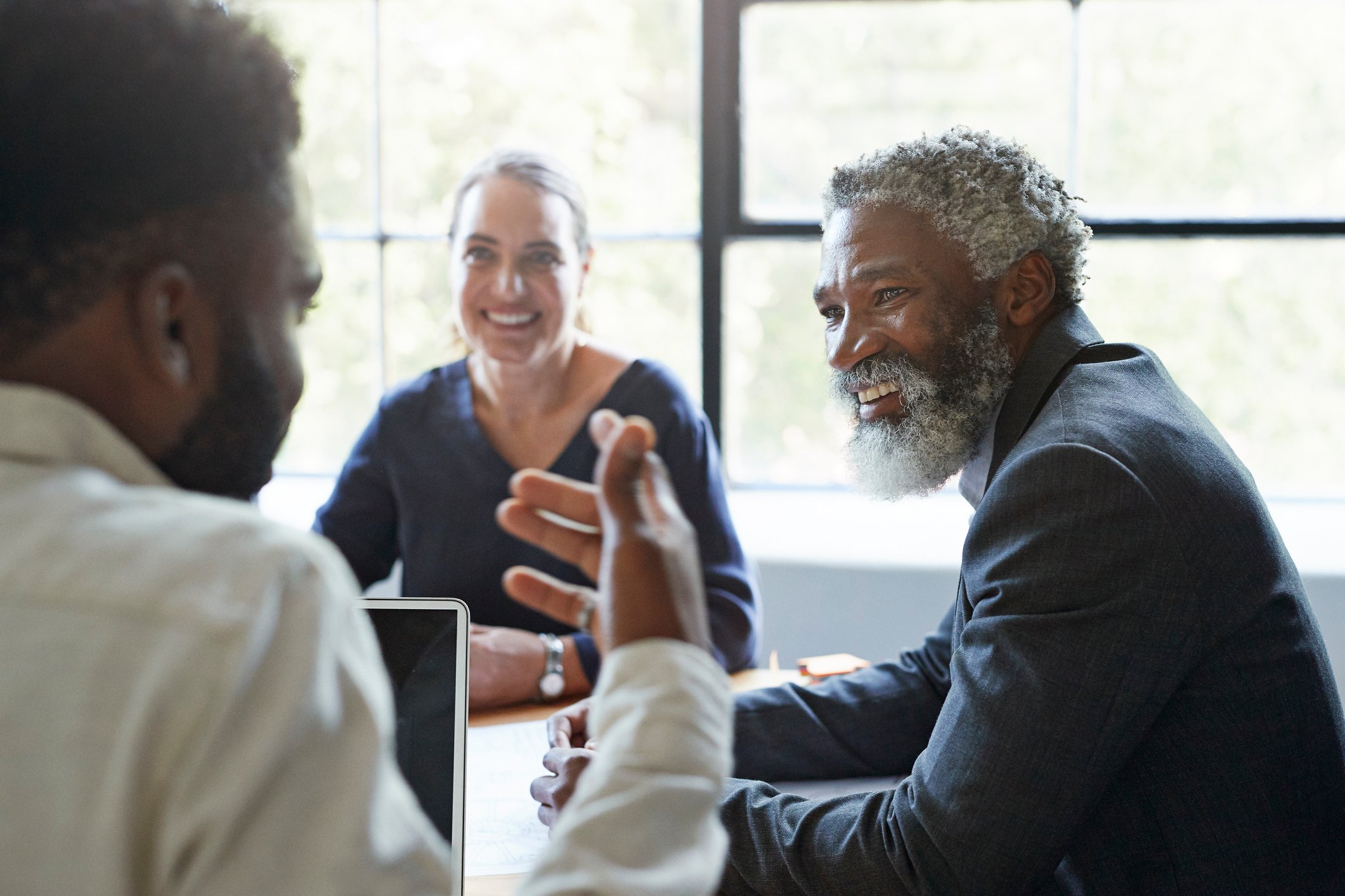 People talking at a table.