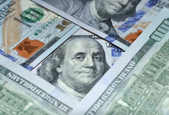 $100 bills artfully and geometrically arranged.