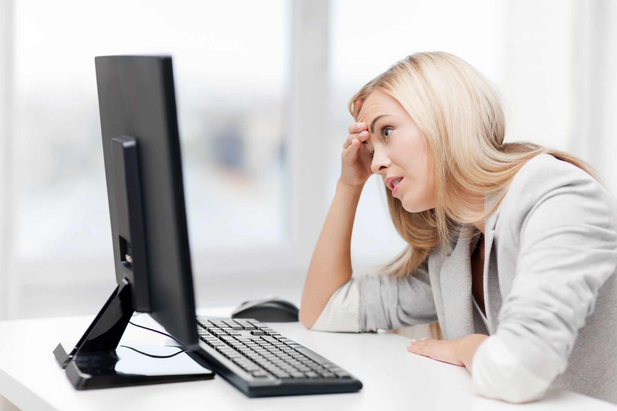 frustrated woman at computer
