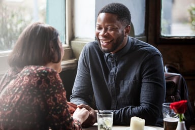 Couple dating in a pub