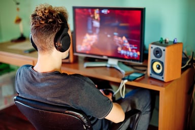 teen-playing-video-game