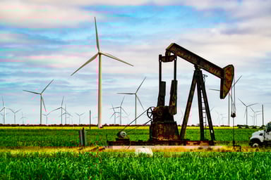 oil pumpjack and wind turbines energy