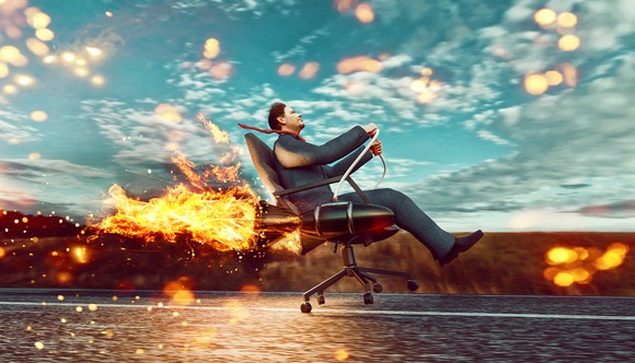 Man on rocket-powered chair moving forwards