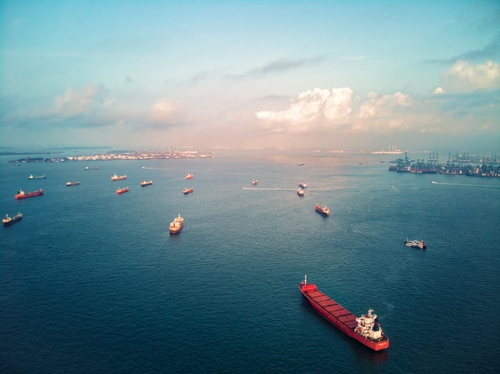 Ocean-going ships waiting to get to port. 