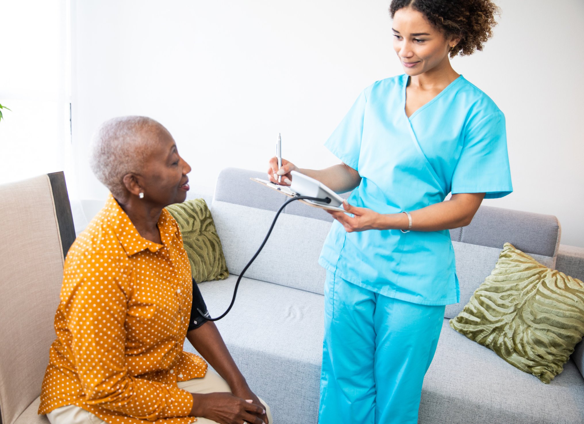 Nurse with patient in home