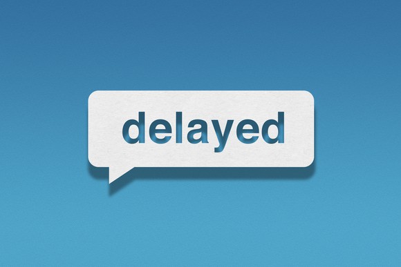 Speech bubble containing the word "delayed" with a blue background.