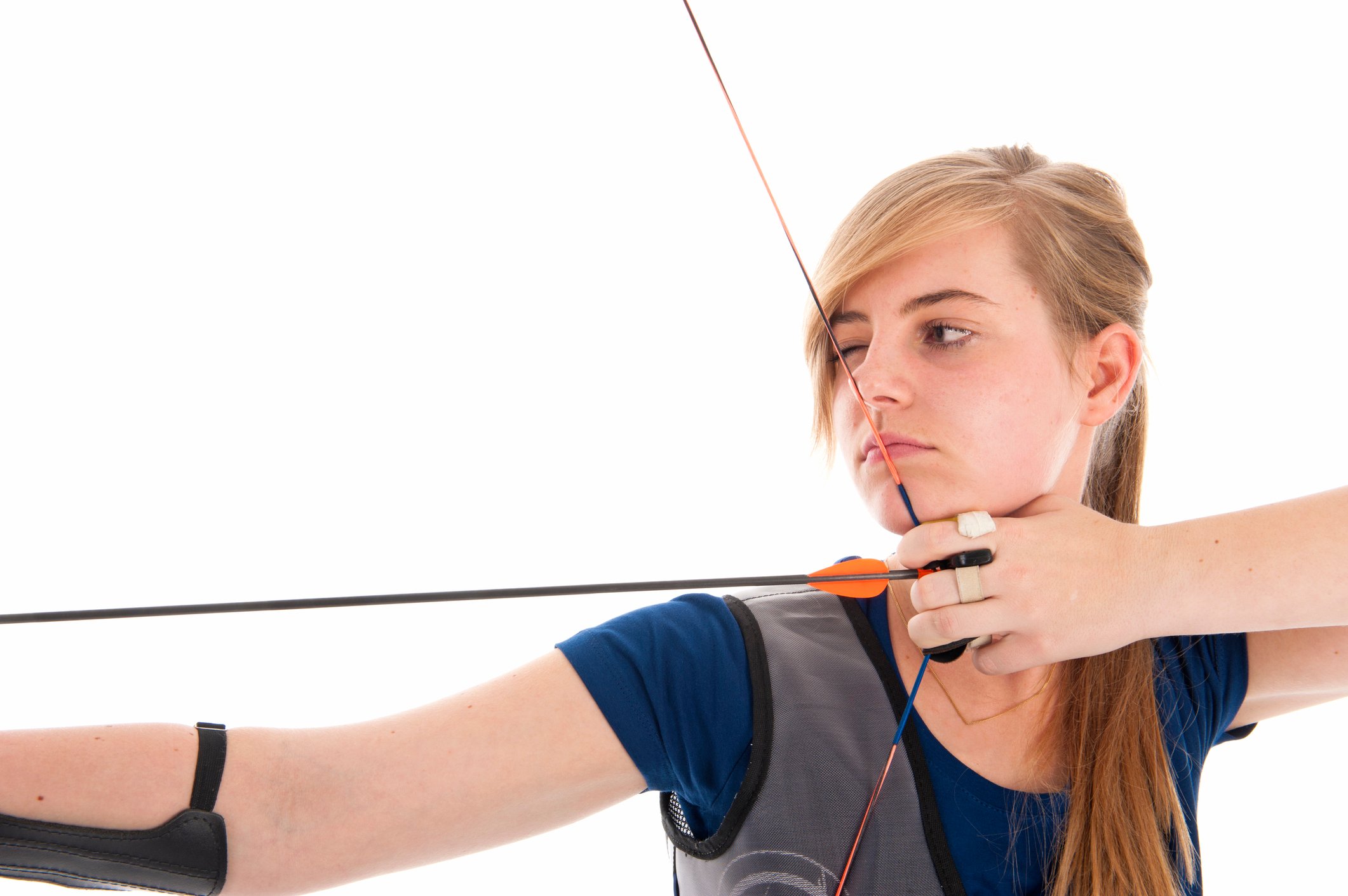 Woman aiming a bow and arrow