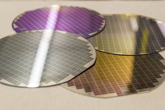 Four silicon wafers.