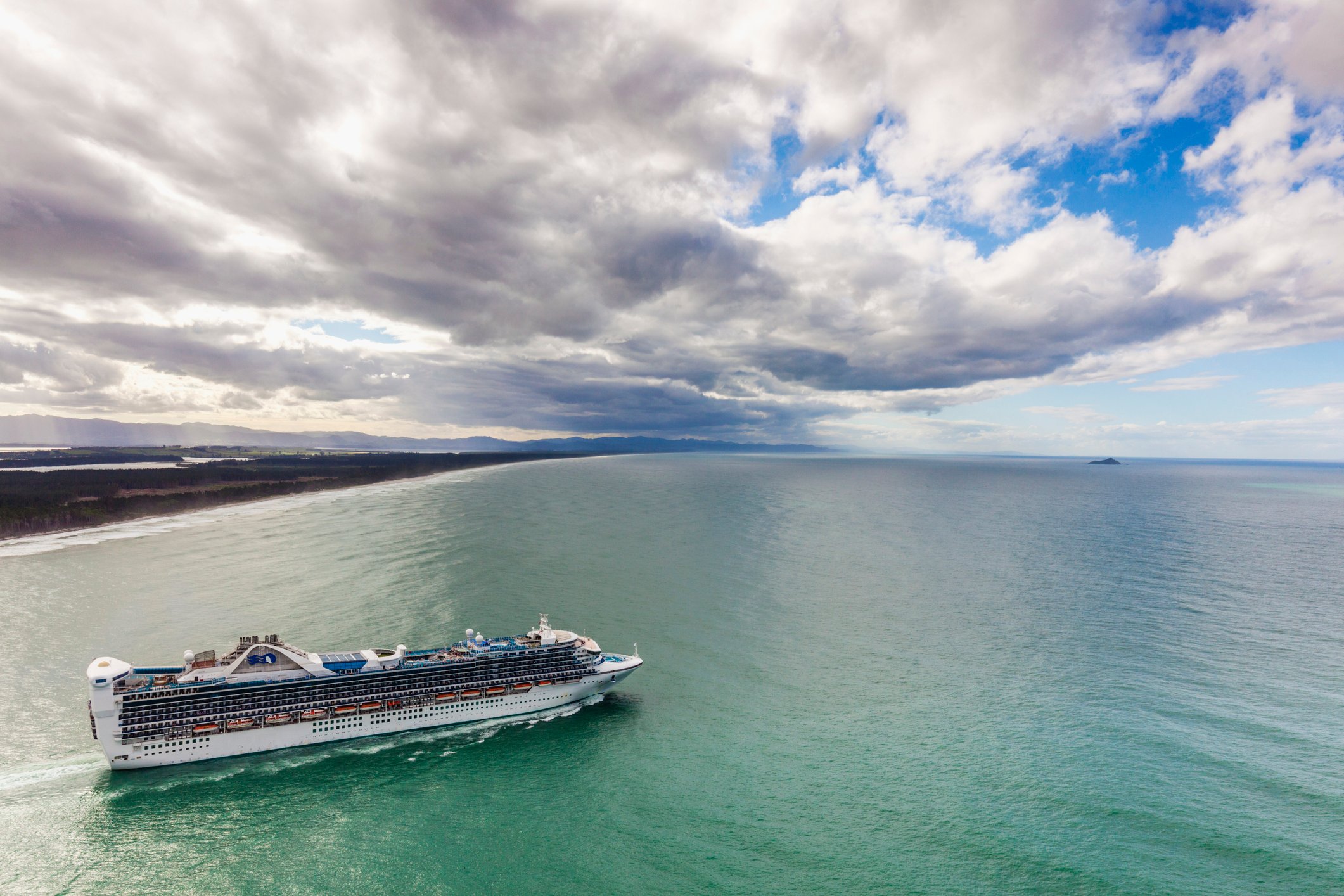 Cruise ship sailing on the ocean.