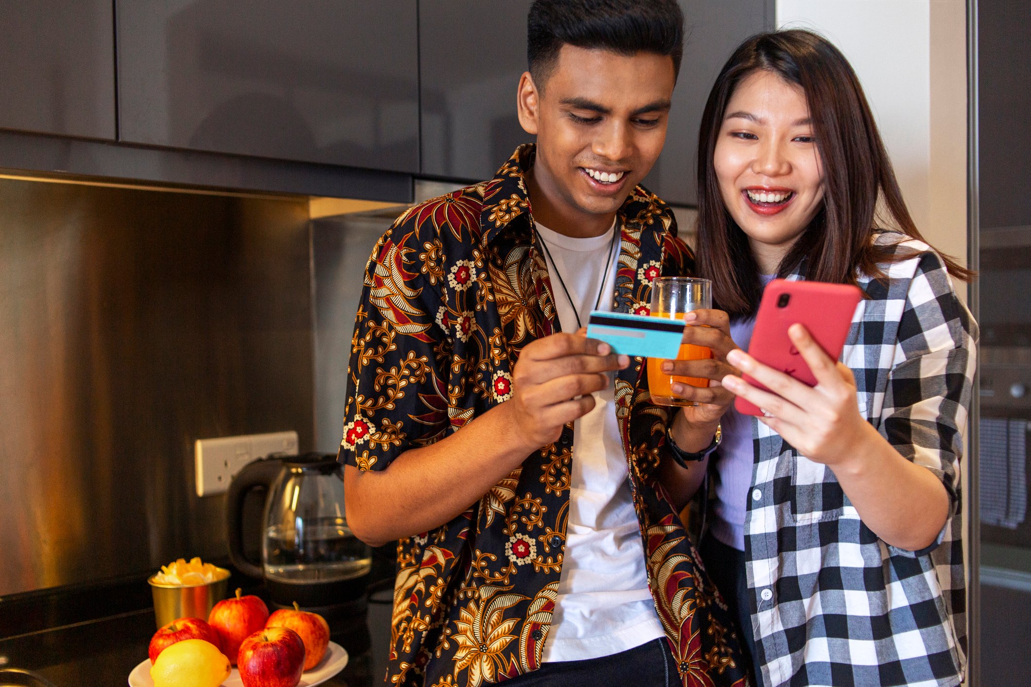 Couple making an online purchase.