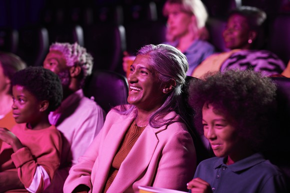 Folks inside a movie theater.