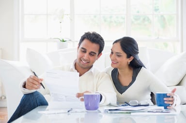 couple looking over a document