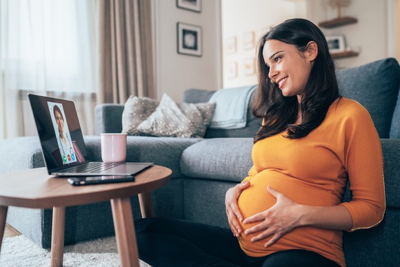 Pregnant woman on a telehealth appointment.