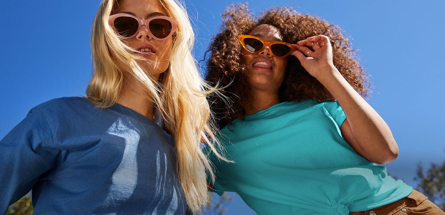 Women in sunglasses and t-shirts.