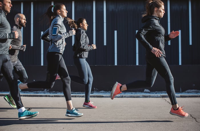 Runners on a street.