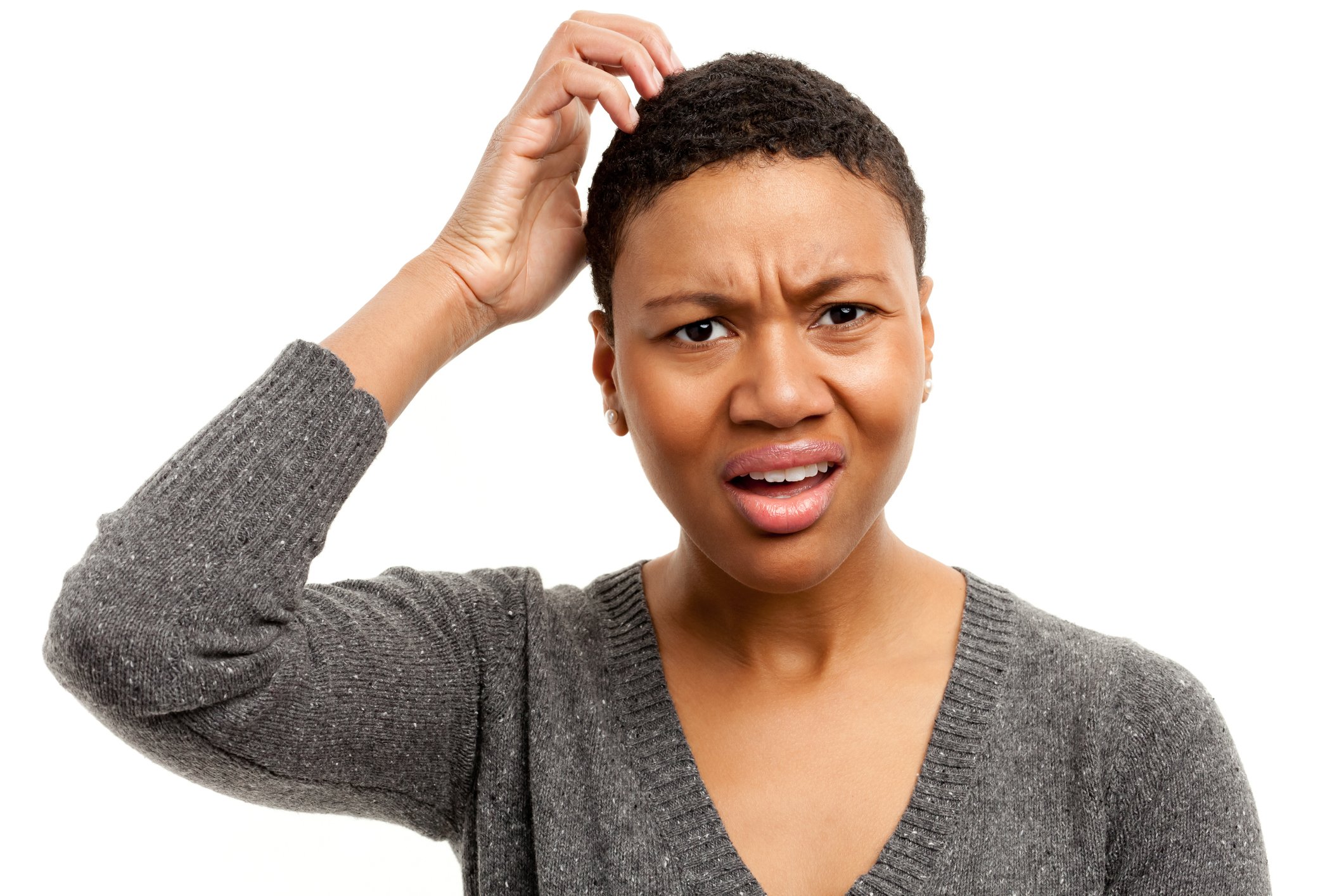 Person scratching head in confusion.