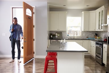 Man unlocks door to home apartment