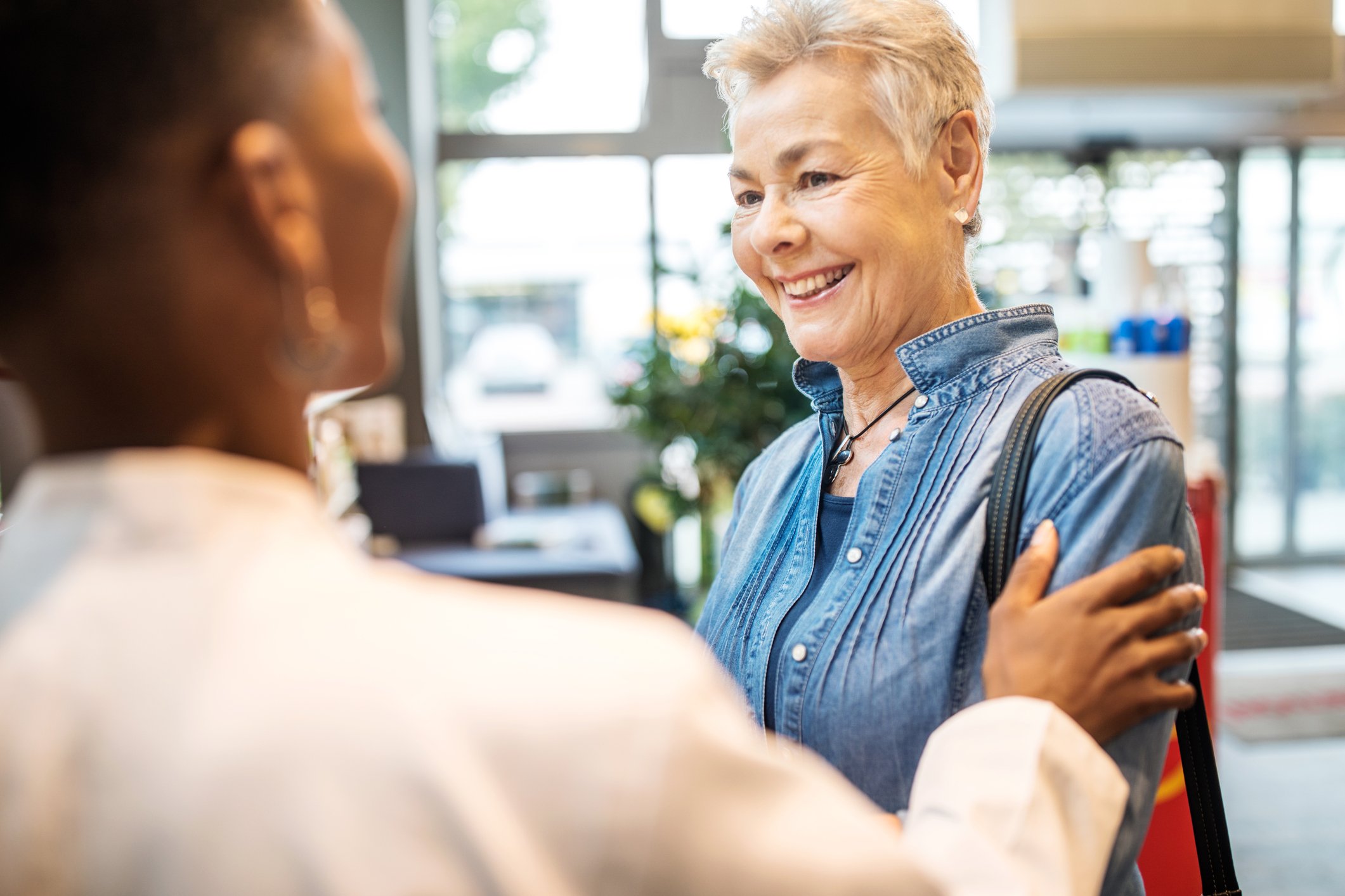 pharmacy clinician consumer sharing a smile