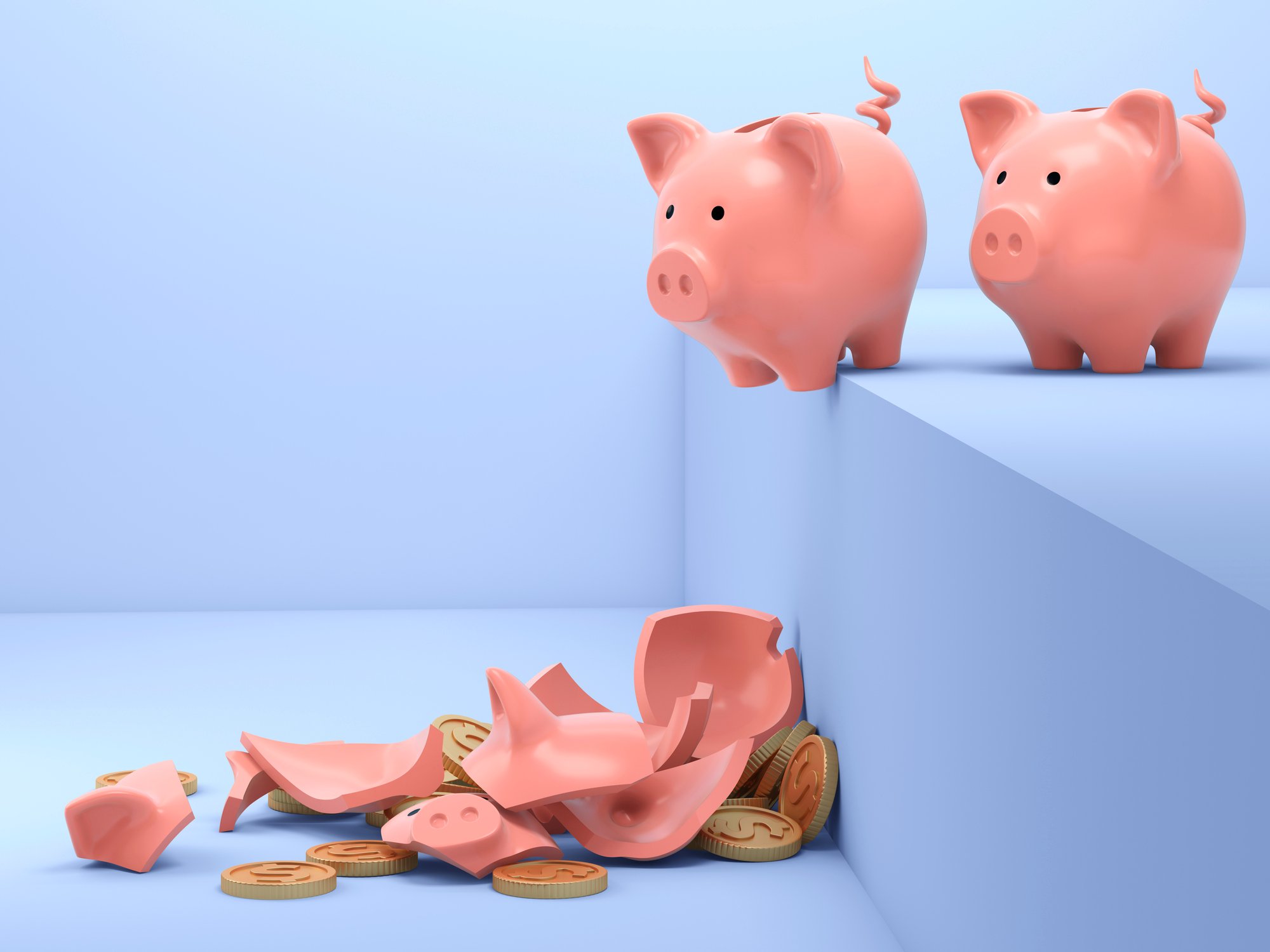 Piggy banks lining up to fall off a step. 